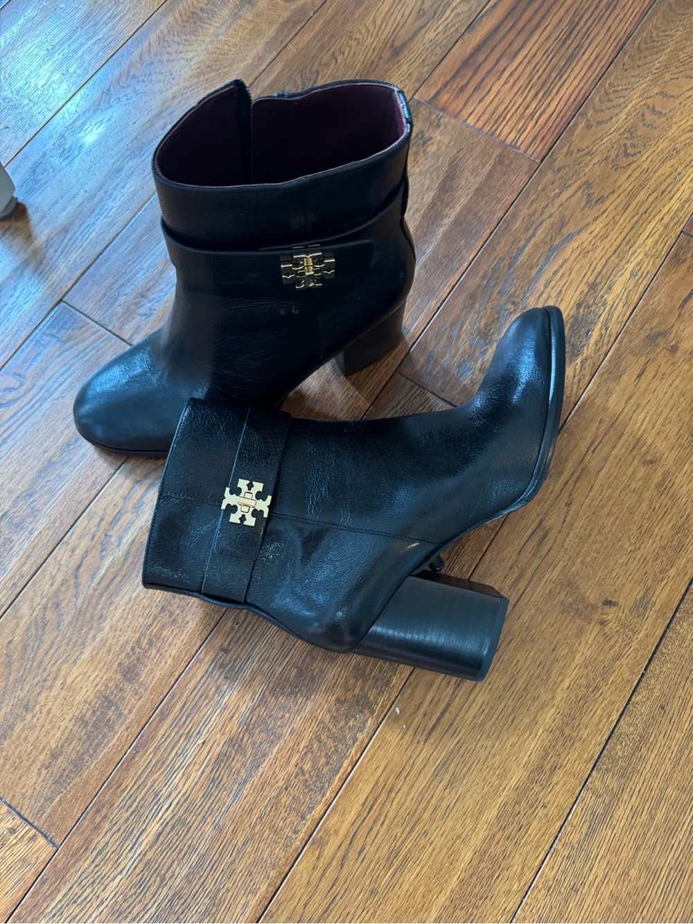 Tory Burch Black Leather Ankle Boots with Gold Logo Accent